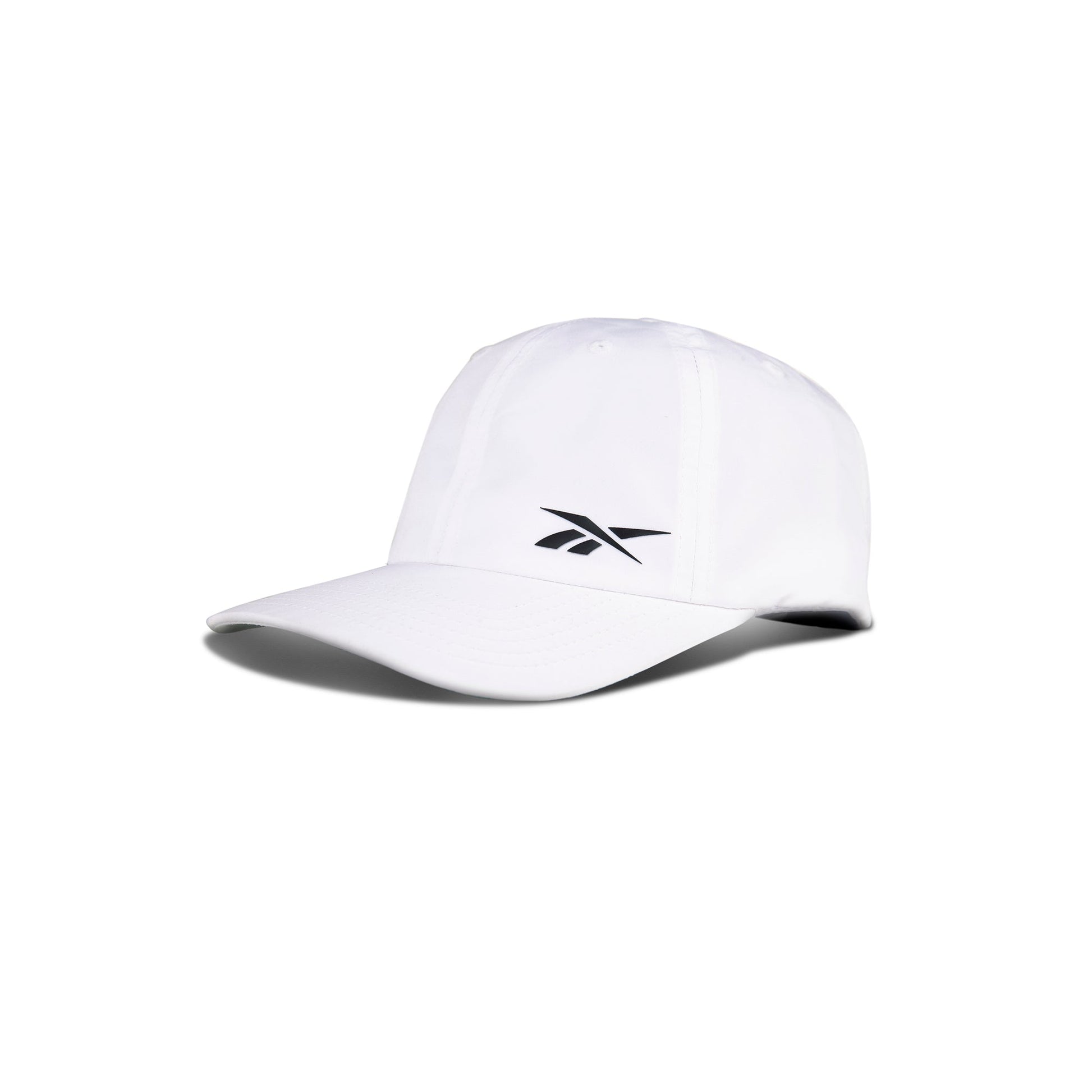 The Reebok Flow Cap is white, made from recycled polyester, and features a curved brim, a black front logo, and a moisture-wicking sweatband—displayed on a plain white background.