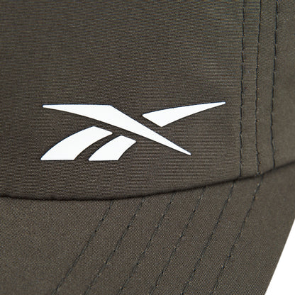 Close-up of the Reebok Flow Cap in brown, crafted from recycled polyester with a white Reebok logo, visible stitching, and a moisture-wicking sweatband for comfort.