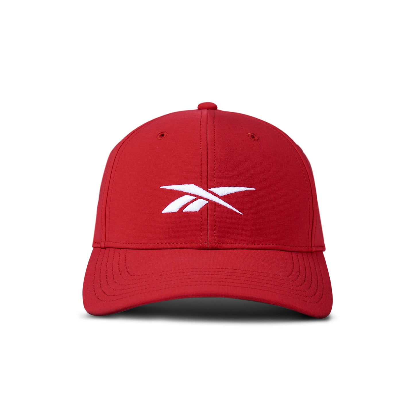 The Reebok Range Cap is a red golf hat with a white logo on the front, featuring moisture-wicking comfort and shown against a plain white background.