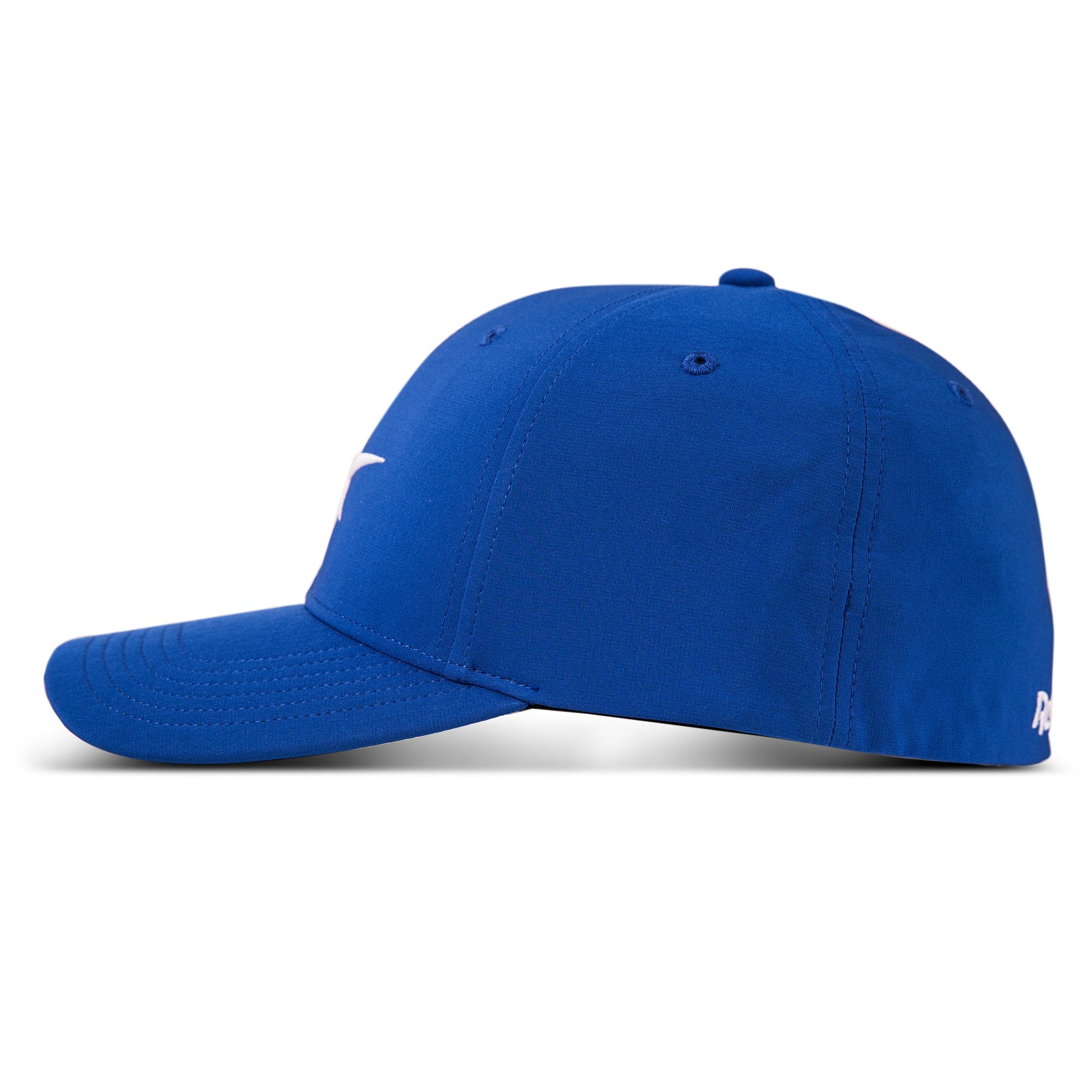 The Reebok Range Cap, shown from the side in blue, features a curved brim, visible stitching, a small white back logo, and moisture-wicking fabric to keep you cool and comfortable on the golf course.