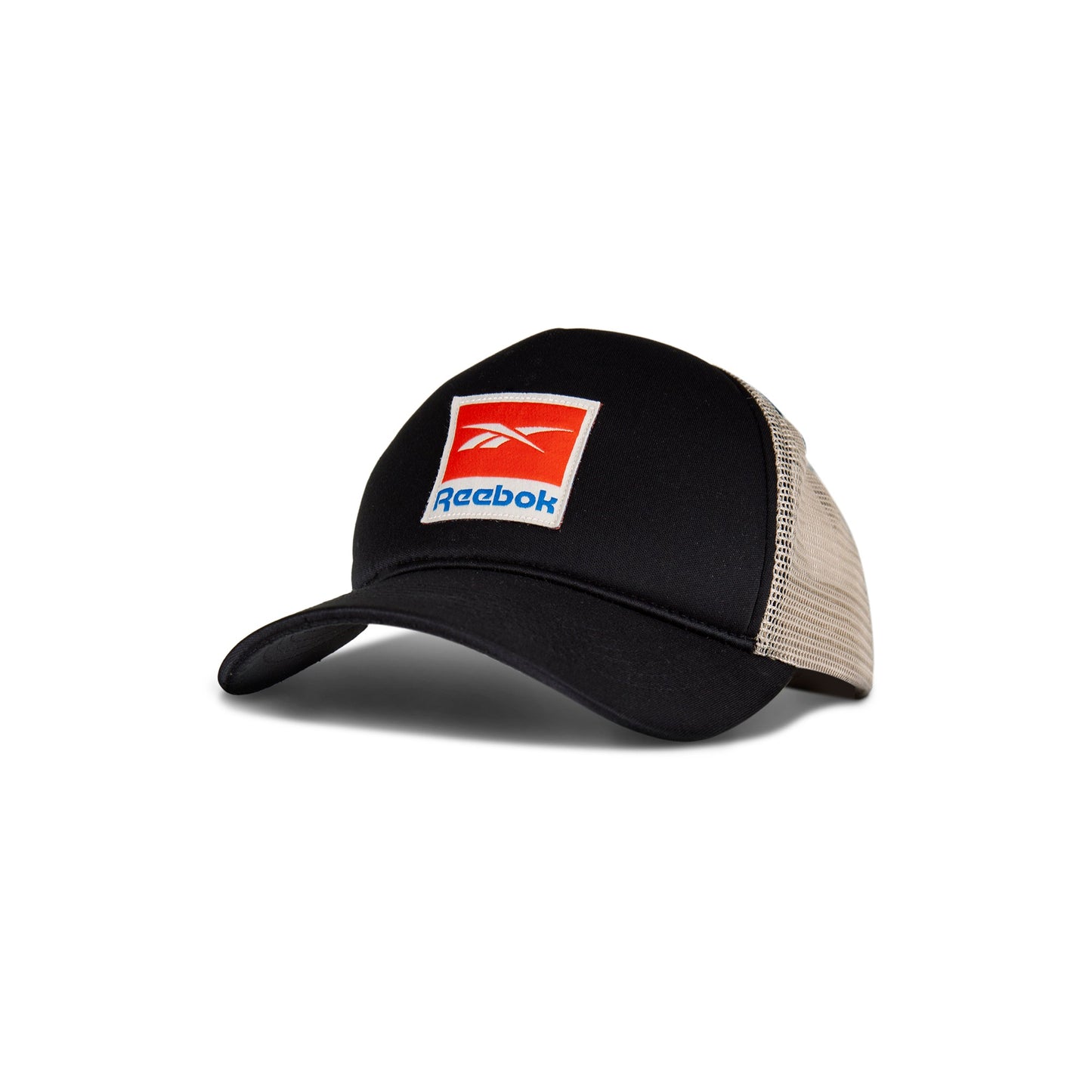 The Reebok Vintage Trucker Cap is a black and beige hat with a curved brim, red and white logo patch on the front, and snapback closure—classic athletic heritage style.