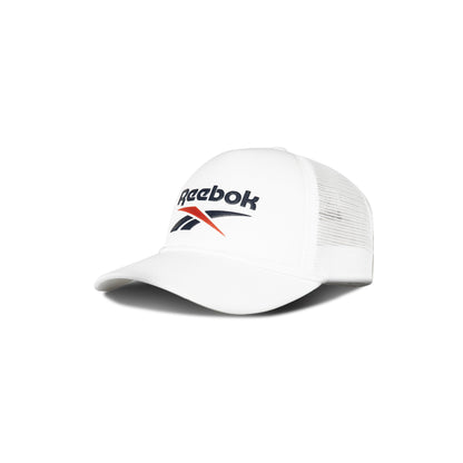 The Reebok Deluxe Aero Cap features a curved brim, breathable mesh back, navy and red Reebok logo, and a moisture-wicking sweatband. Shown against a plain white background.