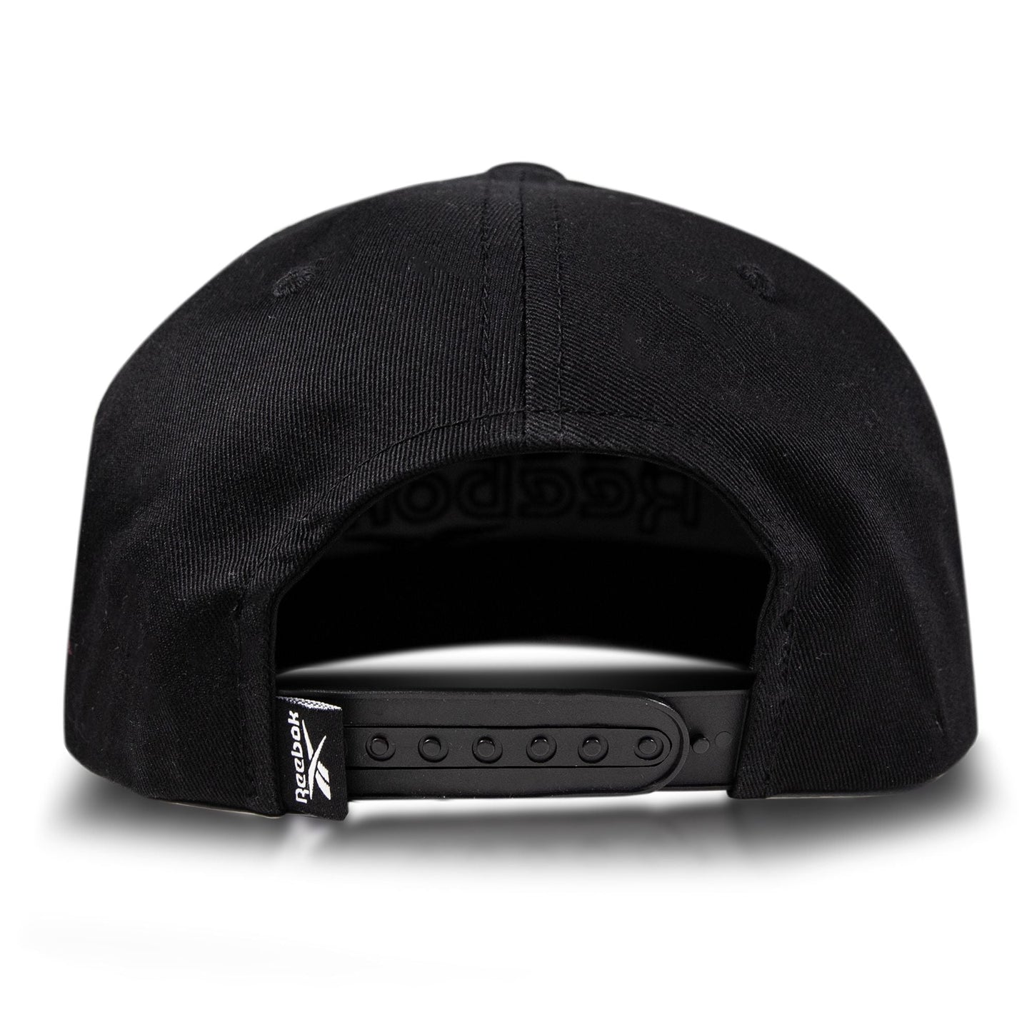 The Reebok Double Vision Cap in black is shown from the back, highlighting its adjustable snapback closure and a small left-side Reebok logo tag—ideal for elevating your street style cap collection.