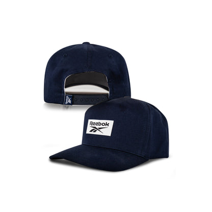Two Reebok Classic 5 Caps are shown: one with the logo visible, the other displaying its adjustable strap. Perfect for athletic wear, these caps feature moisture-wicking fabric for comfort.