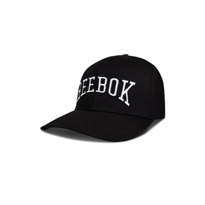 The Reebok Gameday Cap is a classic black baseball cap with "REEBOK" embroidered in large white letters on the front, shown here against a plain white background.