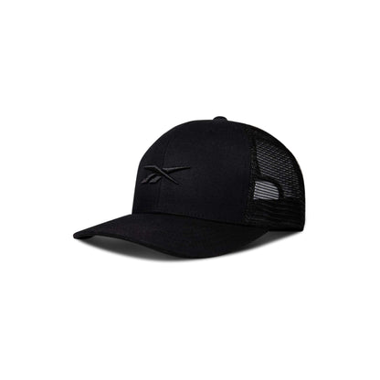 The Reebok Embroidered Vector Trucker Cap is black with a curved brim, mesh back panels, and a minimalist embroidered logo. Shown angled left on a plain white background.