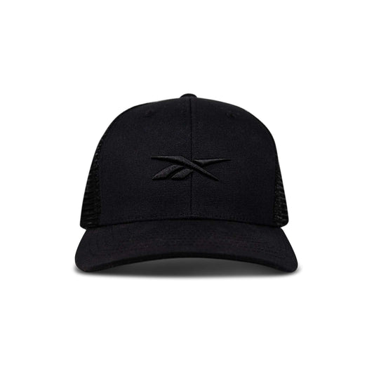 Front view of the Reebok Embroidered Vector Trucker Cap in black, featuring a curved brim, mesh back, and embroidered black Reebok logo on the front panel. Shown against a plain white background.