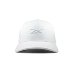 The Reebok Embroidered Vector Trucker Cap is a white baseball cap with a curved brim and a subtle embroidered logo on the front center, shown against a plain white background.