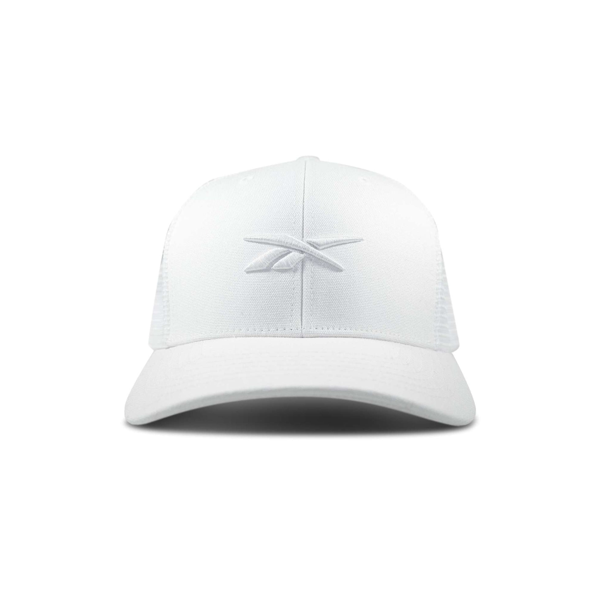 The Reebok Embroidered Vector Trucker Cap is a white baseball cap with a curved brim and a subtle embroidered logo on the front center, shown against a plain white background.