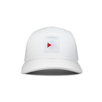 The Reebok Woven Patch Vector Trucker Cap is a white cap with mesh back panels and a rectangular patch on the front featuring the Reebok logo in gray with a red accent.
