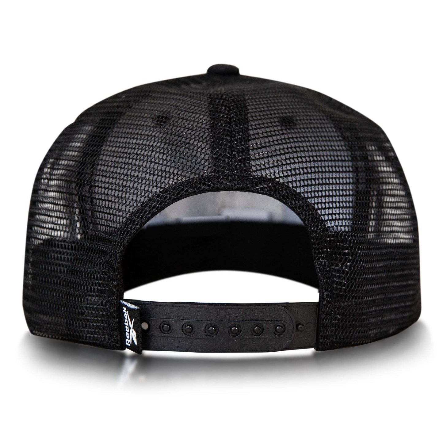 A black mesh snapback seen from the back, the Reebok Basketball Trucker Cap features an adjustable plastic closure—combining sporty style with classic trucker comfort.