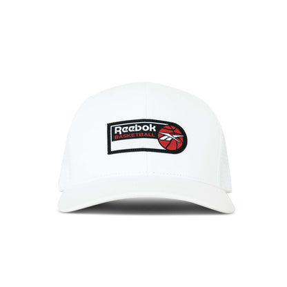 The Reebok Basketball Trucker Cap is a white snapback hat with a curved brim, featuring a logo patch and red basketball graphic on the front, perfect for adding sporty style to any look.