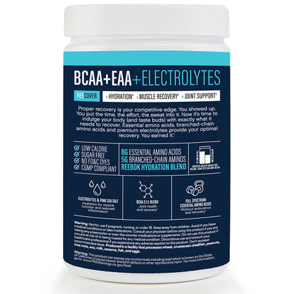 A white Reebok ReeCover BCAA + EAA + Electrolytes container highlights BCAAs, Essential Amino Acids, hydration, muscle recovery, low calorie, no sugar, and lab-tested benefits for workout recovery.