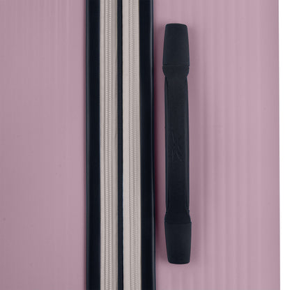 Close-up of the Reebok Action Duo 2 Piece Luggage Set in pink, featuring a textured finish, black handle, zippered compartment with black and white trim, and smooth spinner wheels for easy travel.
