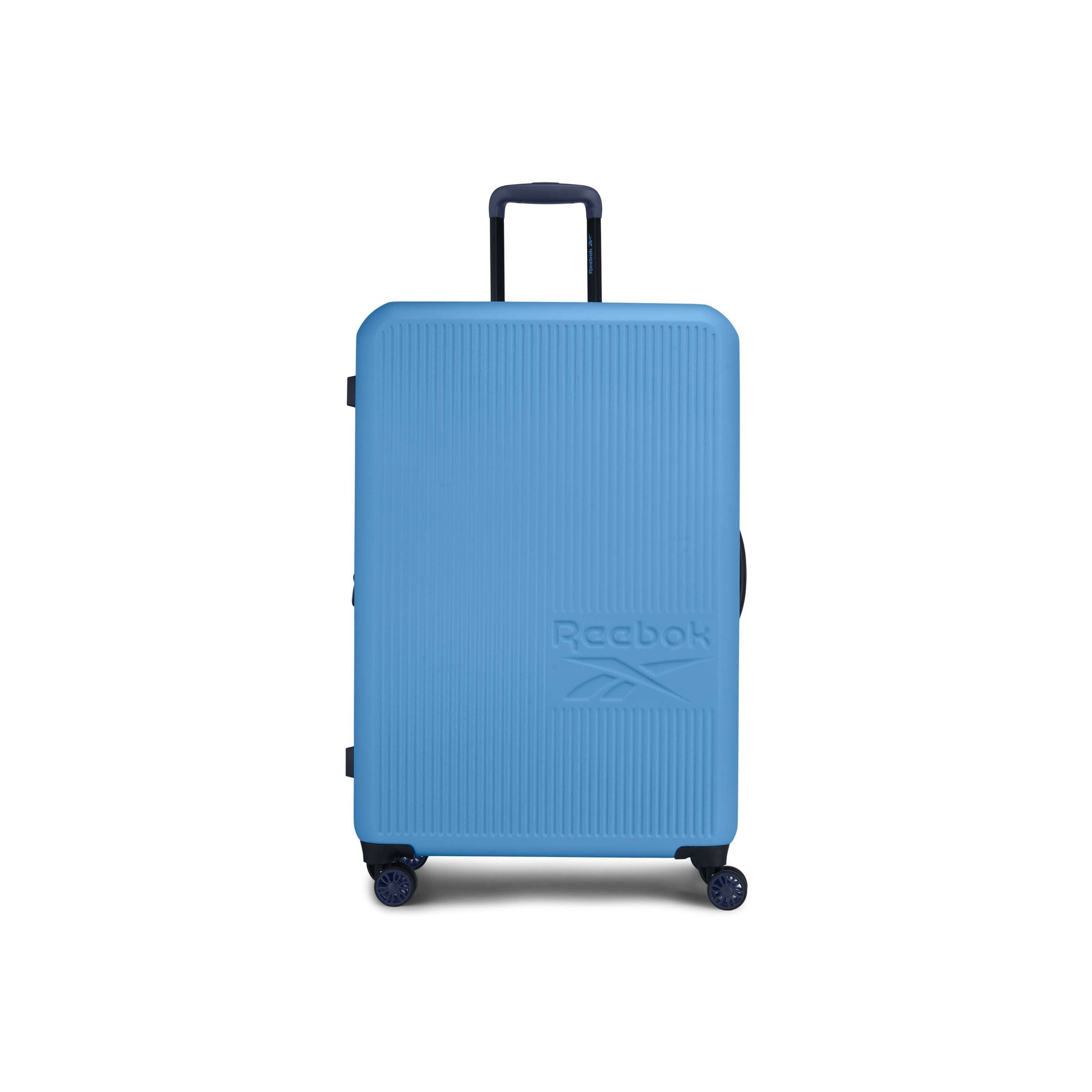 The Reebok Action Duo 2 Piece Luggage Set features a large, hard-shell blue suitcase with spinner wheels, side and retractable top handles, and an embossed logo on the front. Lightweight and shown upright against a white background.