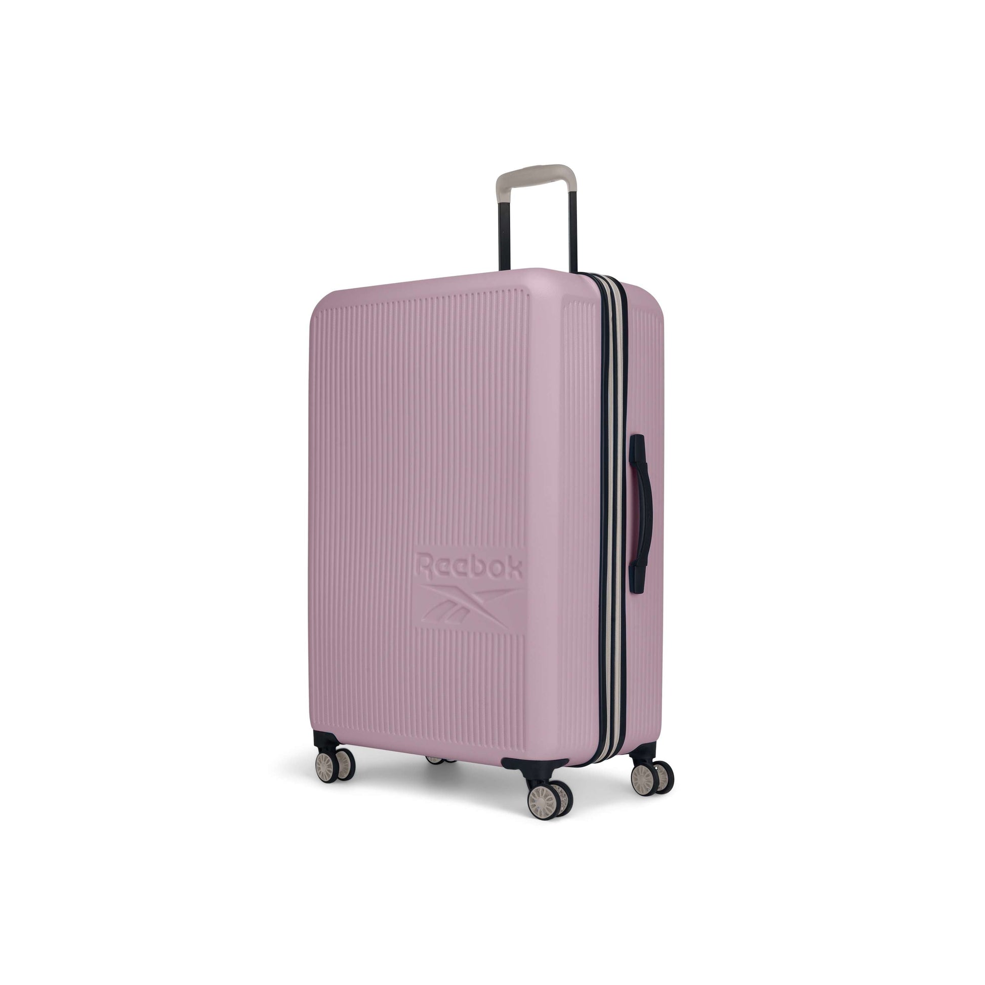 The Reebok Action Duo 2 Piece Luggage Set features a large, light pink hard-shell suitcase with four spinner wheels, a black side handle, and a silver telescopic handle, shown upright on a white background.