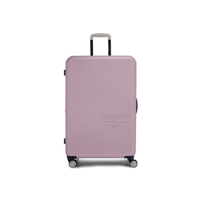 The Reebok Action Duo 2 Piece Luggage Set features large light pink, lightweight suitcases with textured surfaces, black accents, four spinner wheels, telescopic handles, and embossed Reebok logos on the front.