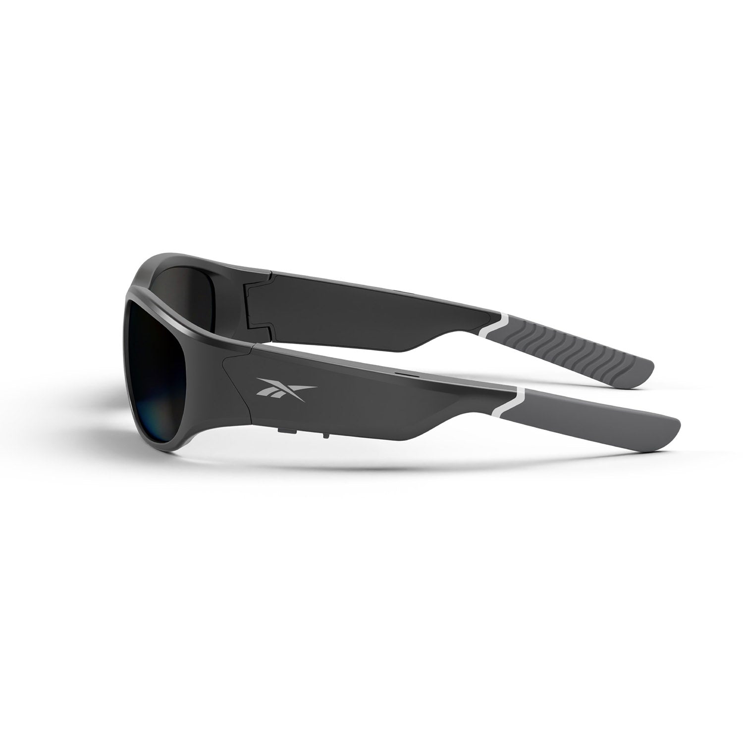 Reebok Nitrous Smart Audio Sunglasses in sleek black feature thick arms, gray rubberized tips, polarized lenses, and a small side logo, displayed against a white background.