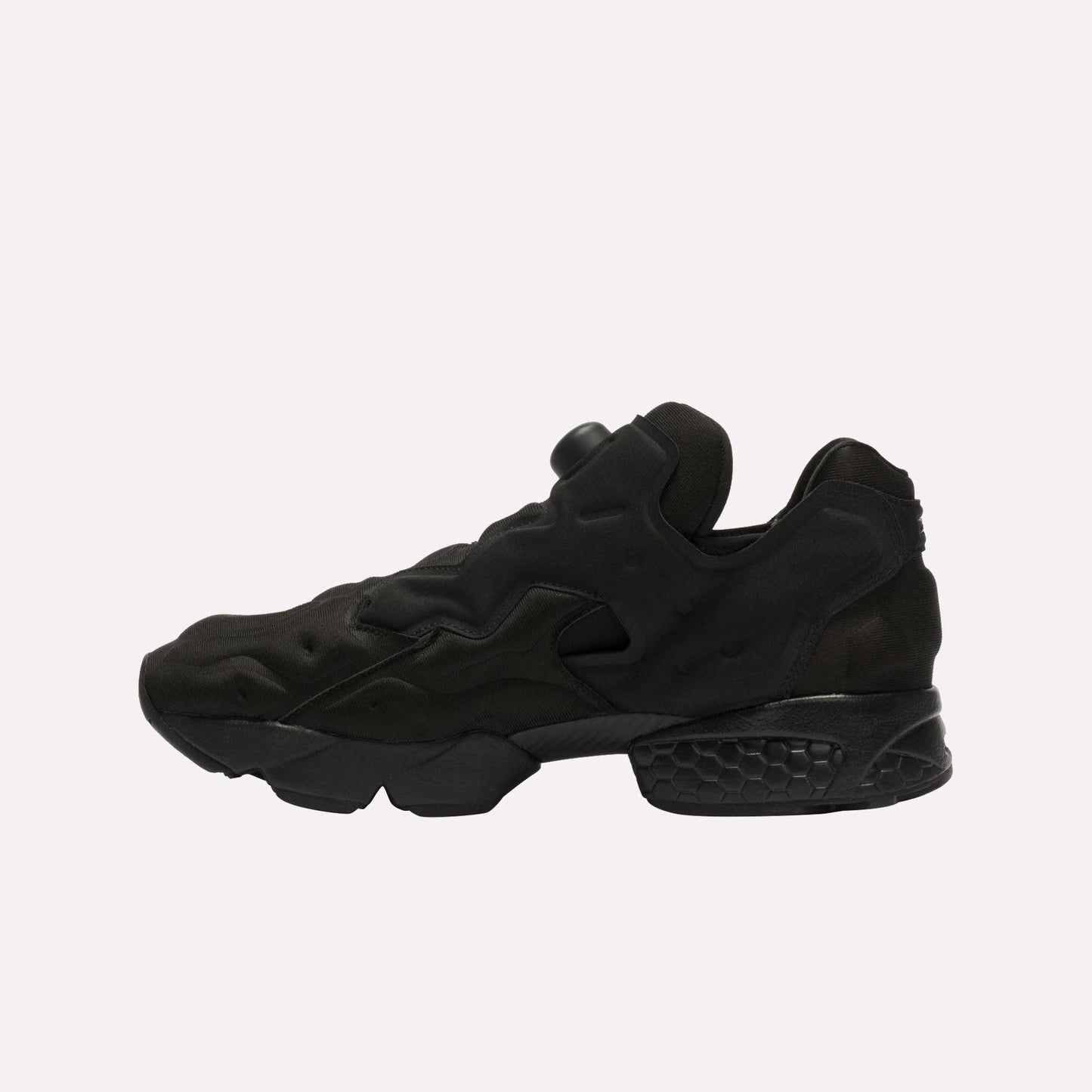 The Reebok Instapump Sliver LTD Shoes are black athletic sneakers with a chunky, sculpted sole and Hexalite cushioning, shown facing left on a plain white background with no visible branding.