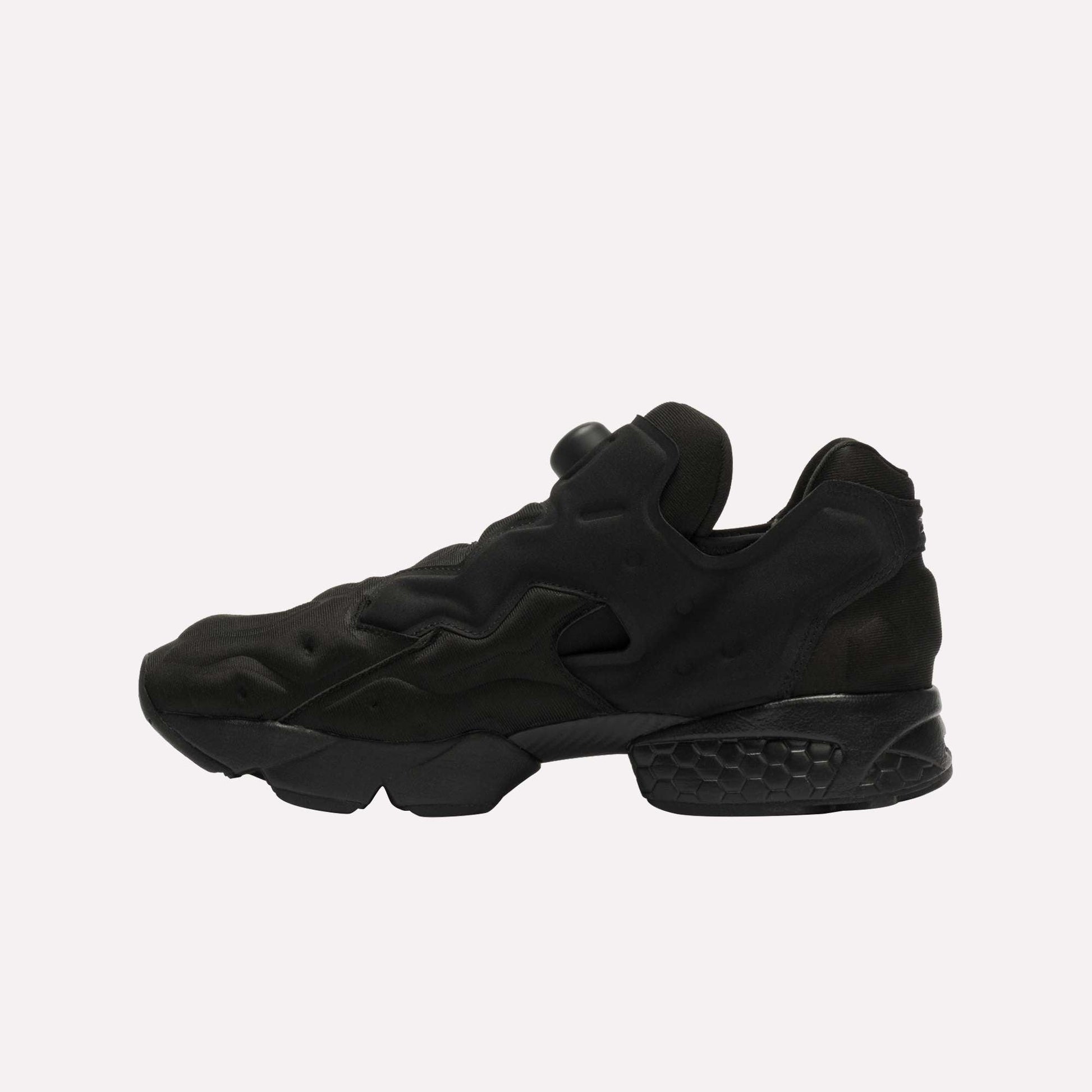 The Reebok Instapump Sliver LTD Shoes are black athletic sneakers with a chunky, sculpted sole and Hexalite cushioning, shown facing left on a plain white background with no visible branding.