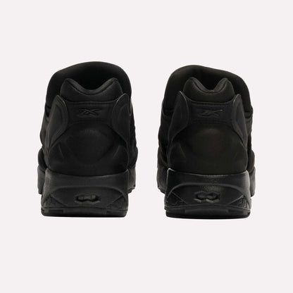 The Reebok Instapump Sliver LTD Shoes are shown from the back on a plain white background, placed side by side to highlight their heel and sole details.