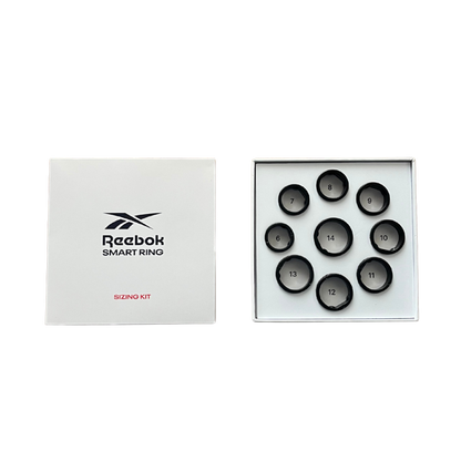 The Reebok Smart Ring Sizing Kit features eight black sample rings (sizes 6–13) in a white tray and a white box—ideal for discovering your perfect fit for the innovative Reebok Smart Ring fitness tracker.