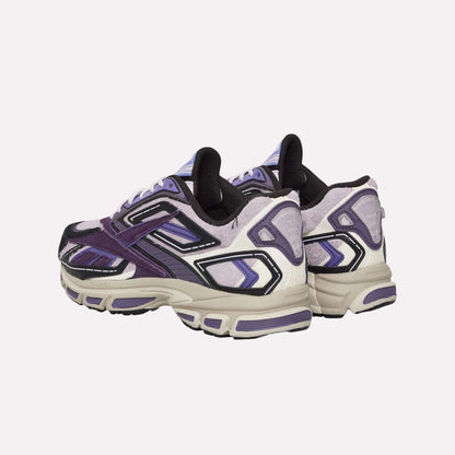A pair of Reebok Premier Road Ultra Shoes in purple, black, and white with thick dual-density midsoles, displayed from the back and side on a white background.
