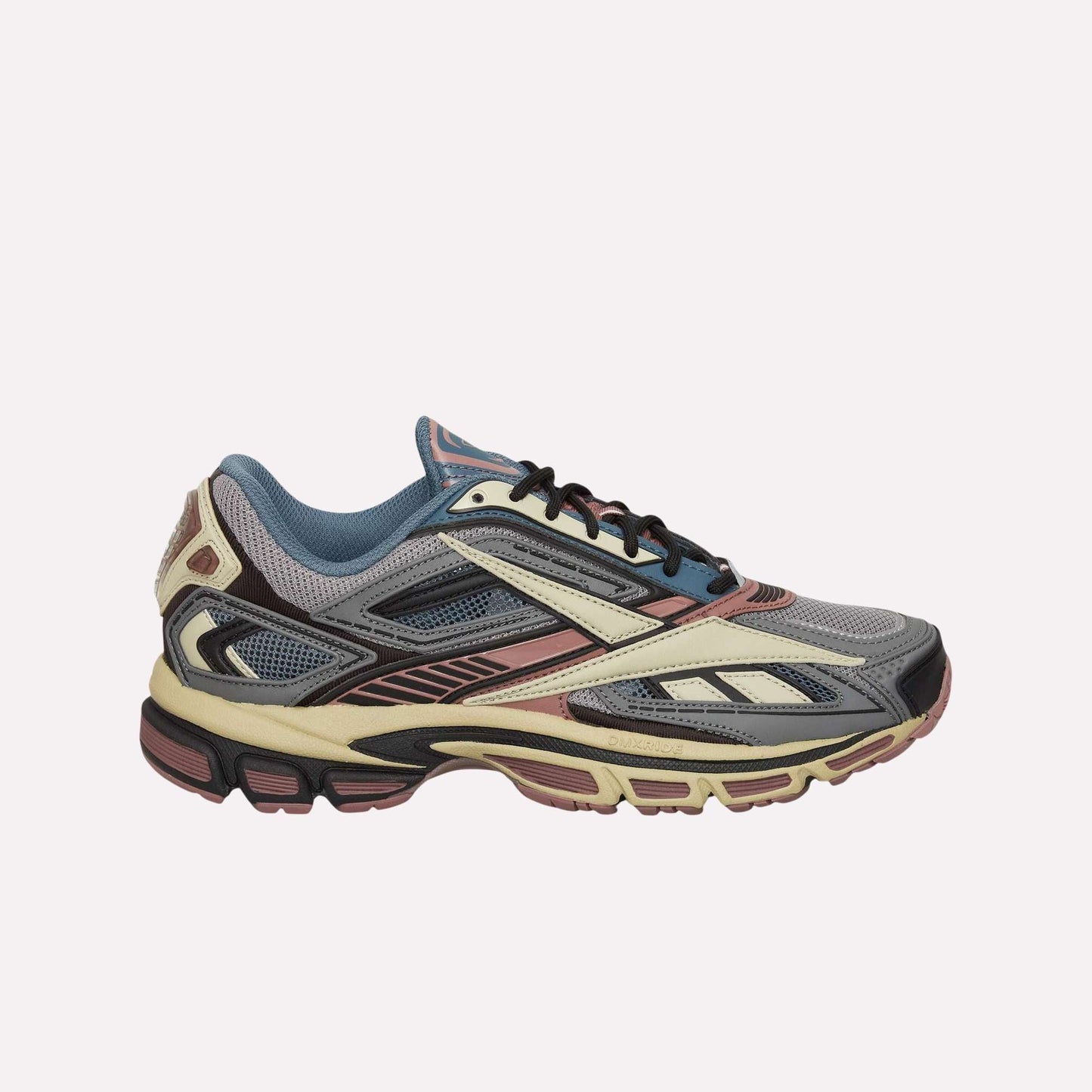 The Reebok Premier Road Ultra Shoes are shown in a left side profile on a light blue background, featuring a multicolored design with gray, blue, burgundy, cream, and black accents and a dual-density midsole for enhanced comfort.