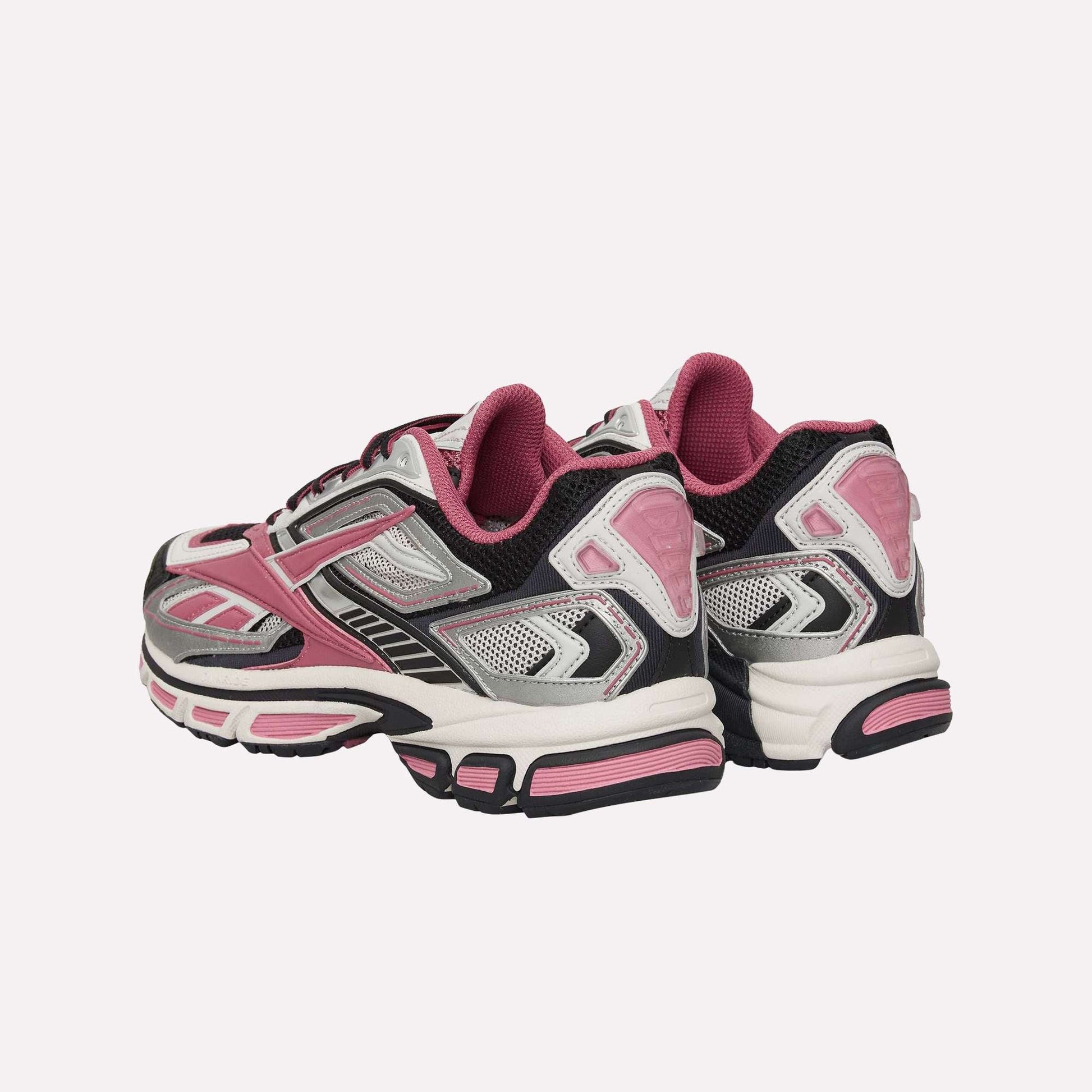 The Reebok Premier Road Ultra Shoes are pink and grey running sneakers, featuring a dual-density midsole for enhanced comfort.