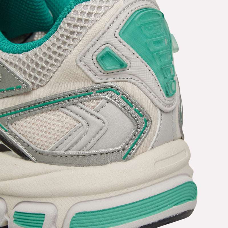 A close-up of the Reebok Premier Road Ultra Shoes, highlighting their retro running-inspired design and comfortable dual-density cushioned midsole.