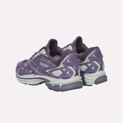 The Reebok Premier Road Ultra Shoes are purple and gray running sneakers with mesh and synthetic overlays, chunky soles, and a dual-density midsole for comfort, shown from the rear and slightly to the side.