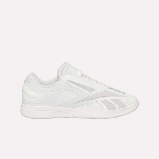 The Reebok Hammer Pro LTD Shoes are white low-top athletic sneakers with subtle gray accents, lace-up closure, a durable rubber sole, and layered side details. Displayed in profile against a white background.