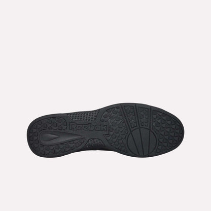 The image displays the black durable rubber sole of Reebok Hammer Pro LTD Shoes from below, highlighting textured patterns and the word "Reebok" embossed near the arch.