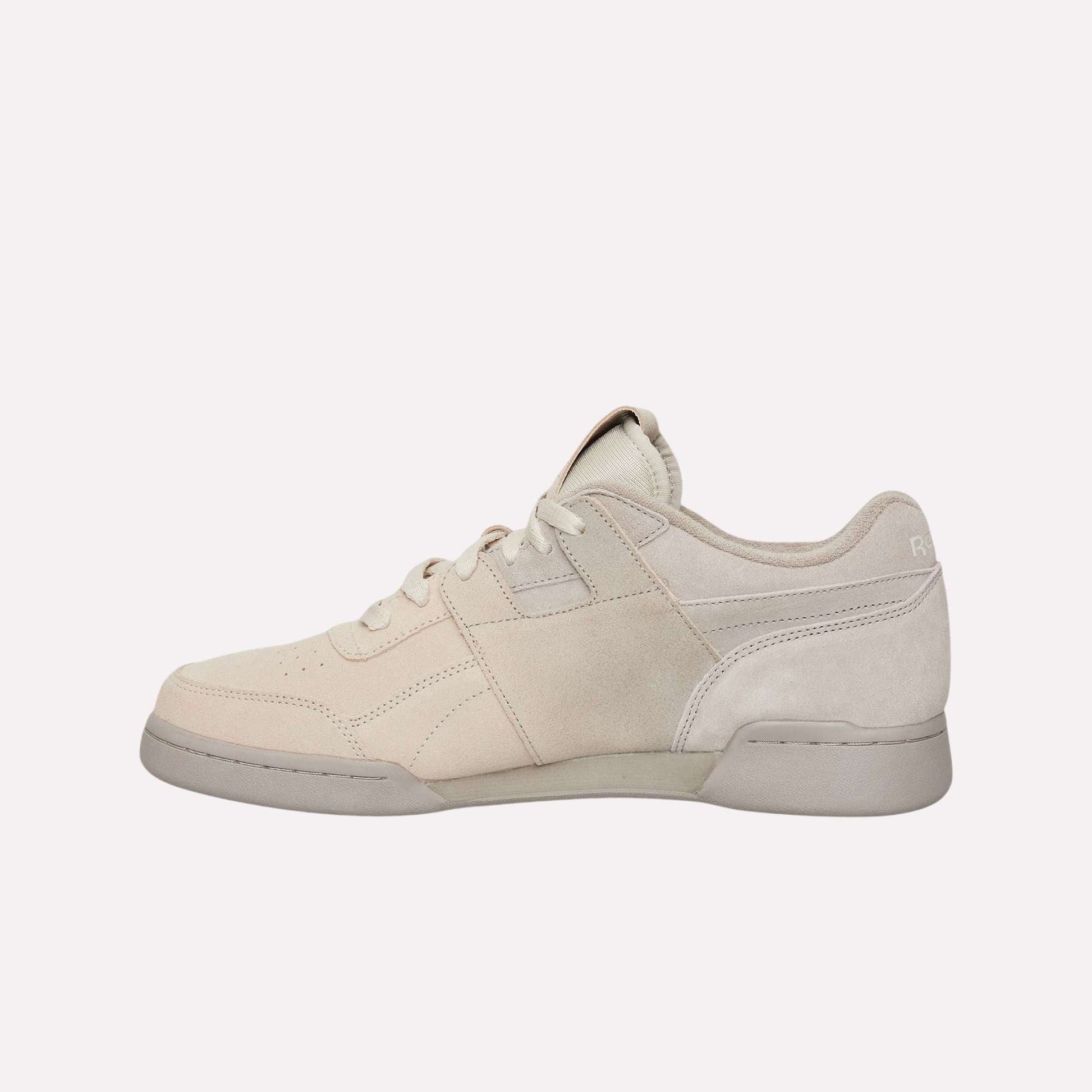 A close-up of the Reebok Workout Plus Og Shoes highlights their classic retro silhouette, showcasing timeless style and attention to detail.
