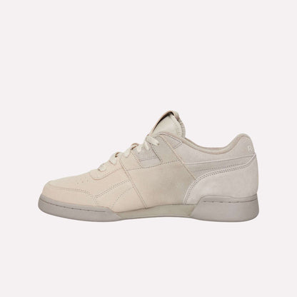 A close-up of the Reebok Workout Plus Og Shoes highlights their classic retro silhouette, showcasing timeless style and attention to detail.