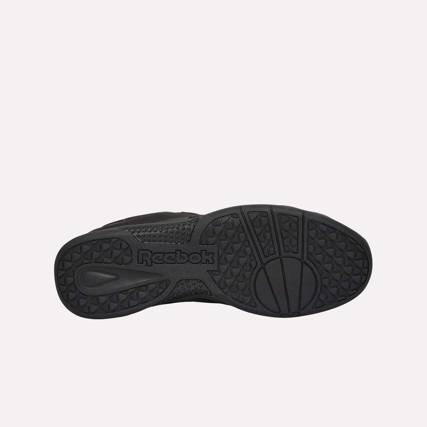 The Hammer Pro Ltd sneakers by Reebok feature a sturdy black rubber sole, seen from below with the Reebok logo and multiple tread patterns designed to deliver excellent grip and traction.
