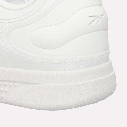 Close-up of the heel and side of the Reebok Hammer Pro Ltd, showing a suede upper with textured details, visible stitching, and an embossed Reebok logo near the ankle.