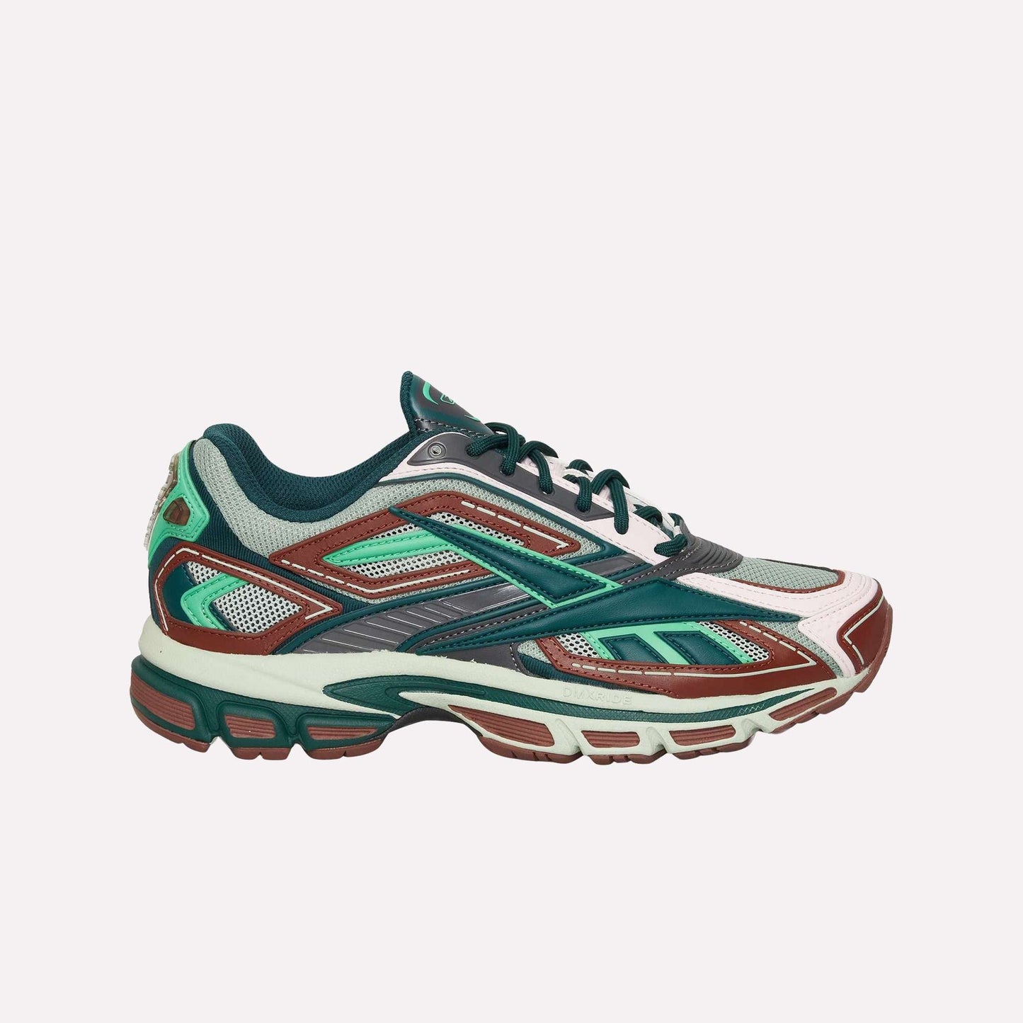 The Reebok Premier Road Ultra is a multicolored running sneaker in green, teal, maroon, white, and gray with a mesh upper, layered synthetic overlays, cushioned sole, and dual-density midsole for enhanced comfort.
