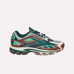 The Reebok Premier Road Ultra is a multicolored running sneaker in green, teal, maroon, white, and gray with a mesh upper, layered synthetic overlays, cushioned sole, and dual-density midsole for enhanced comfort.